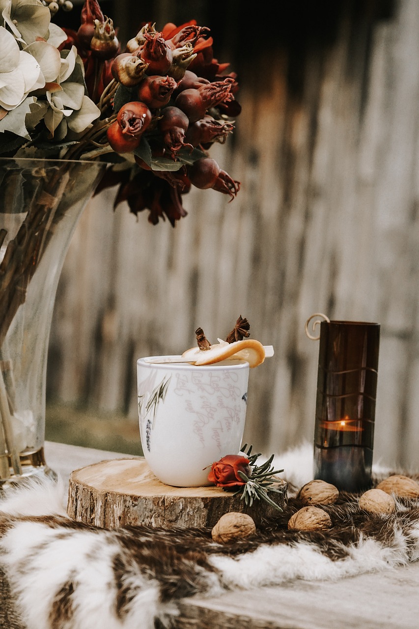 amber soy candle on wooden table